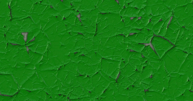 Wand mit beschädigter grüner Farbe
